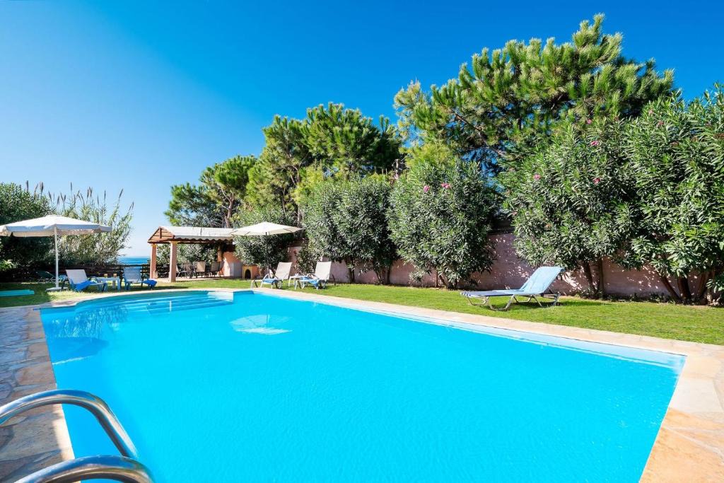 Agios Matthaios Villa | Beachfront Villa Rania by PosarelliVillas
