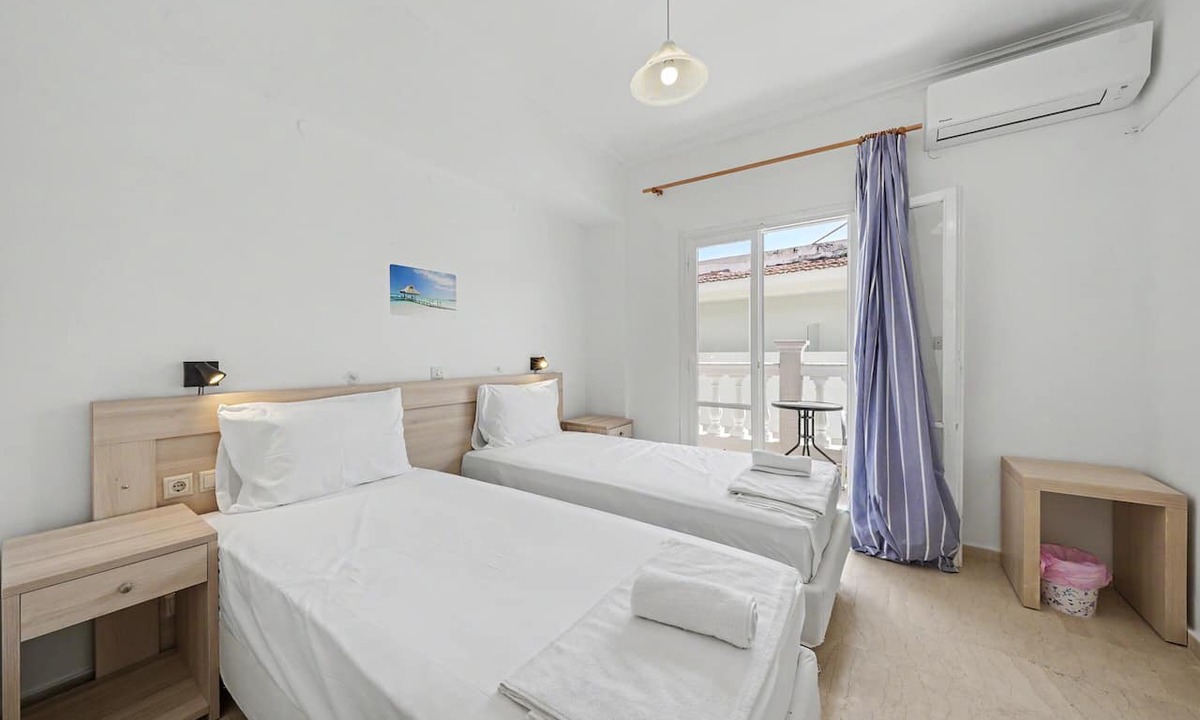 Kavos Bed & Breakfast | Bed and Breakfast 'The Kavos Sandy Inn-Double Room' with Shared Pool, Wi-Fi and Air Conditioning