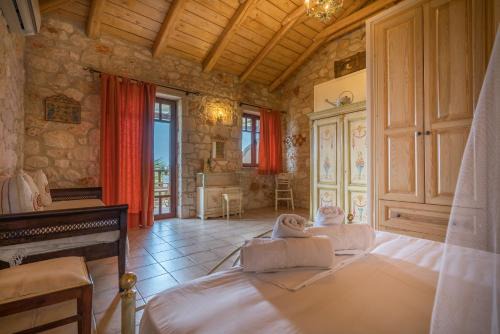 Vasilikos House | Myrties stone houses - Ta Petrina