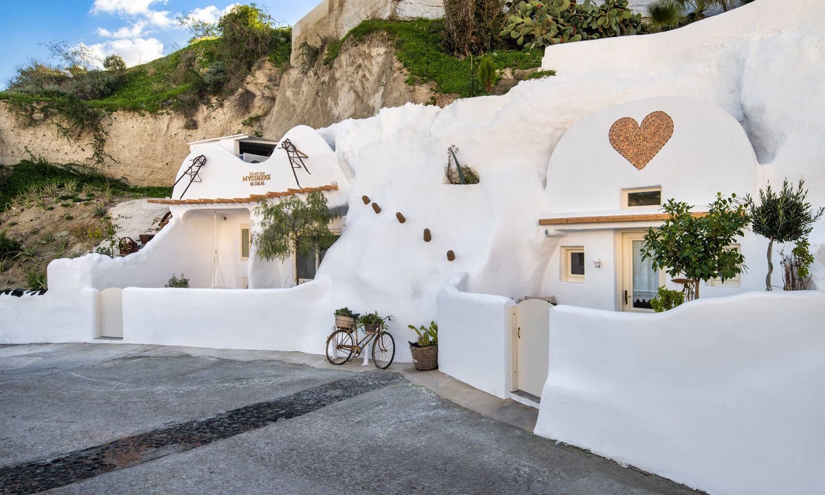 Messaria Villa | Mystagoge Retreat cave with an indoor pool and gym