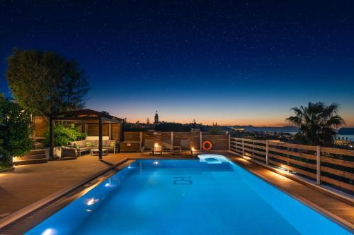 Kato Stalos Villa | Seaview Garden Villa - Heated Pool & Sauna