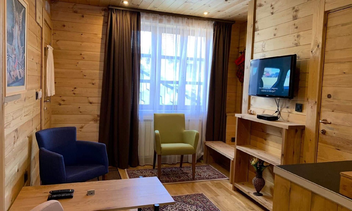 Kolasin Apartment | The Ski Suite has one bedroom and a small living room with no kitchen.