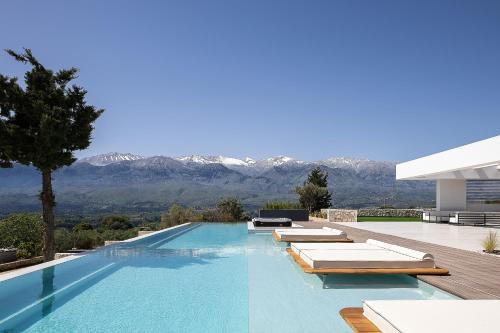 Kaina Villa | Versante Rousso - Modern Living in Nature's Embrace by etouri