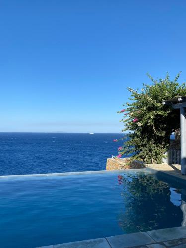 Pisses Villa | Waterfront villa "Afros" with a pool, direct access to the sea and a small beach