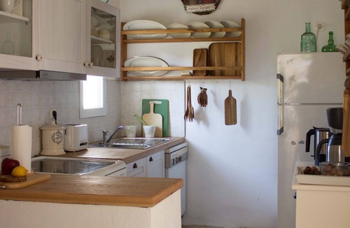 Sithonia House | A cottage hidden in vine and olive grooves