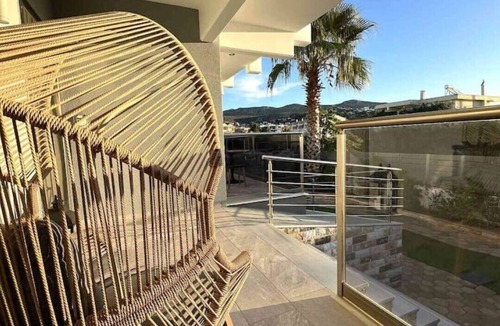 Porto Rafti Villa | Allure Villa, beachfront, featuring a gym, sauna, and jacuzzi