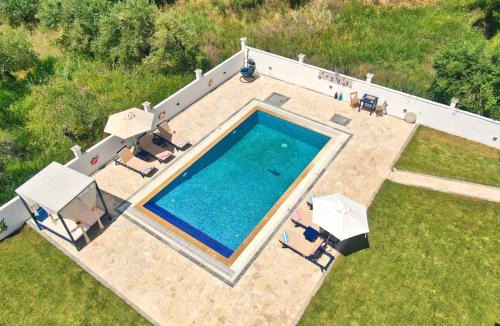 Agios Matthaios Villa | Angelloti Exclusive Beach Villa