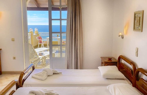 Agios Georgios Pagon Apartment | Apartment for 2 people with a beautiful sea view just 50m from the beautiful sandy beach