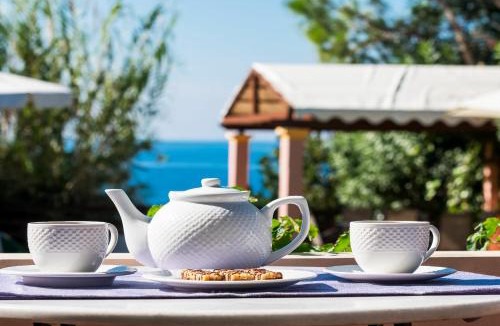 Agios Matthaios Villa | Beachfront Villa Rania by PosarelliVillas