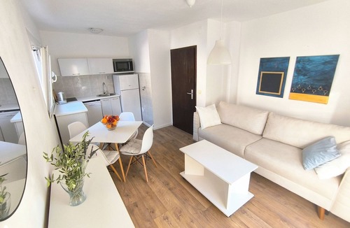 Lazi Condo | Bright 1BR apartment with two balconies, mountain views, sea glimpses and PKG