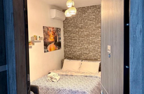 Edessa Apartment | Central & Riverfront Room 1