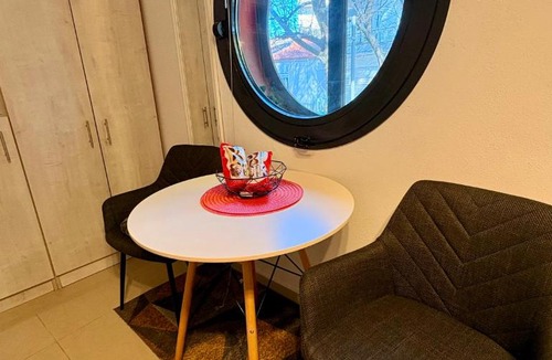 Edessa Apartment | Central & Riverfront Room 1