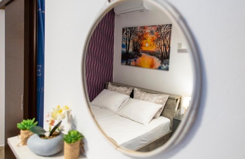 Edessa Apartment | Central & Riverfront Room 1