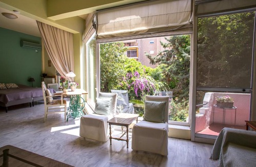 Argyroupoli Apartment | Charming Sunlit Apartment with Garden Views