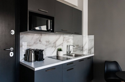 Kinosargous Apartment | Comfy 1BR Apartment at WYZ Athens