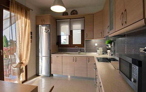 Siviri Villa | Elani Hill Villa by Luxlikehome