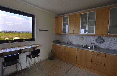 Tingaki House | Ferienvilla "Xenos 2" mit Blick auf das Wasser by Interhome