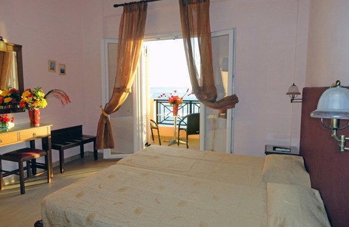 Benitses Apartment | Galini Sea Apartment 1 at the Beach with Wi-Fi, A/C & Garden