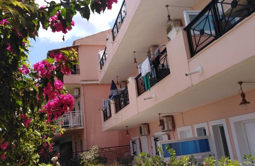 Benitses Apartment | Galini Sea Apartment 1 at the Beach with Wi-Fi, A/C & Garden