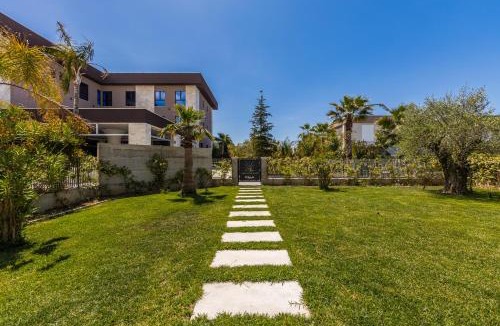 Ishem Villa | Garden Breeze Stay Villa 1 - Gala Residence by PikHost
