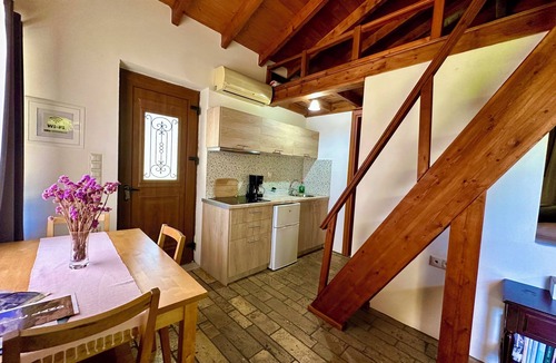 Pyrgos Apartment | Genari Beach Apartments – Garden View House with Partial Sea View