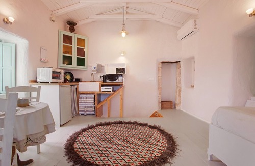 Elation House | Greek Stone House 'Sira Stonehouse 3' with Sea View, Wi-Fi and Air Conditioning