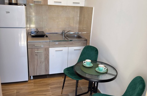 Seoca Apartment | Ground-floor studio apartment w/separate entrance & private tiled terrace.