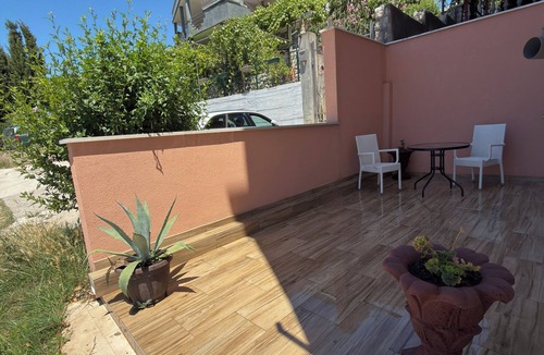 Seoca Apartment | Ground-floor studio apartment w/separate entrance & private tiled terrace.