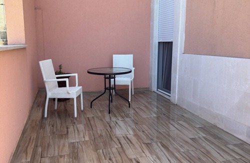 Seoca Apartment | Ground-floor studio apartment w/separate entrance & private tiled terrace.