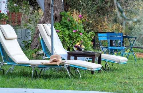 Argyrades Apartment | Holiday Apartment "Chara's Holiday Home" with Garden, Terraces & Wi-Fi