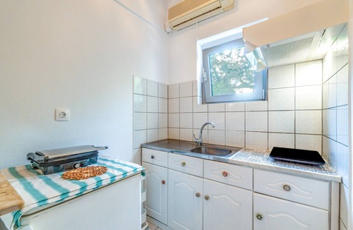 Ag. Georgios House | Holiday Home 'Pleasure Corfù Octopus' with Private Terrace, Wi-Fi and Air Conditioning
