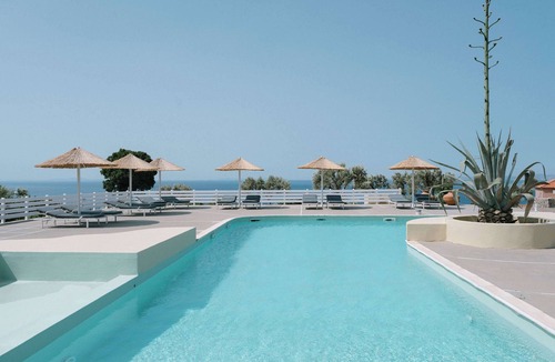 Ormos Koumeikon Apartment | Intimate Studio with Garden Views and Inviting Shared Pool