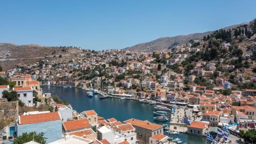 Symi House | kalosymi house, traditionelles haus mit hafenblick
