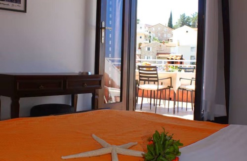Sveti Stefan Apartment | Large terrace overlooking the island, two bedroom