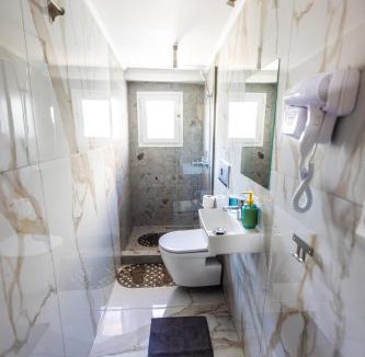 Paralia Dionysiou Apartment | MIRA LUXURY APARTMENTS