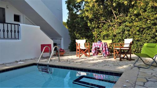 Aegina Town House | Navy dream by Vasilis