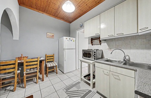 Ag. Georgios Apartment | 'Nefeli Apartment 1st Floor' with Sea View, Garden & Wi-Fi