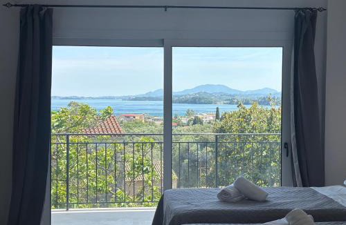 Ipsos Apartment | Olga's Sea & Garden View Studios, 400m from Ipsos Beach
