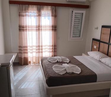 Perissa Hotel | Petra Nera