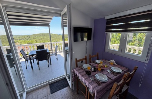 Lustica Apartment | Relax far away from it all and wake up to sea views and Montenegrin charm