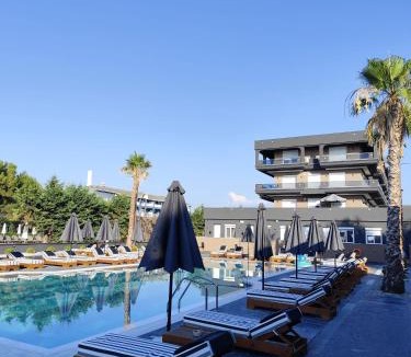Korinos Apartment | Sandra Beachfront - Pool, Beach Bar and Olympus View