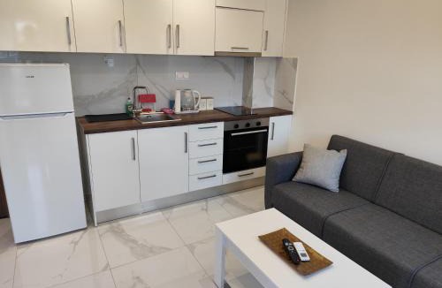 Korinos Apartment | Sandra Beachfront - Pool, Beach Bar and Olympus View