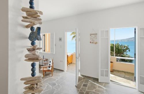 Perdhika Apartment | Seaside garden home with BBQ & sunset views