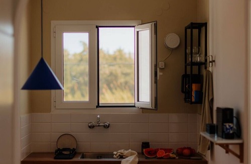 Parikia Apartment | Studio Apartment '15' with Mountain View, Wi-Fi and one Air Condition in the bedroom.