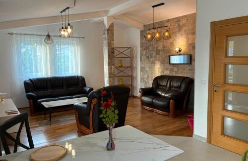 Burtaisi Apartment | The Rustic Stone Residence