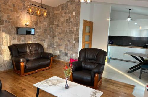 Burtaisi Apartment | The Rustic Stone Residence