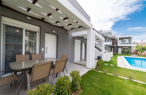 Paralia Ofryniou Villa | Two - Bedroom Loft with Pool Access, in Perla Residential Complex