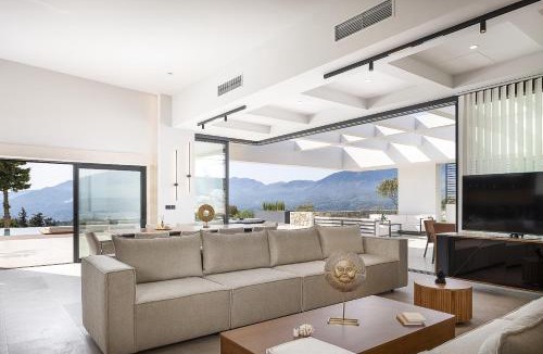 Kaina Villa | Versante Rousso - Modern Living in Nature's Embrace by etouri