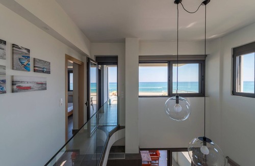 Adelianos Kampos Villa | Villa al Mare. Beachfront with private sunbeds and sunshades!