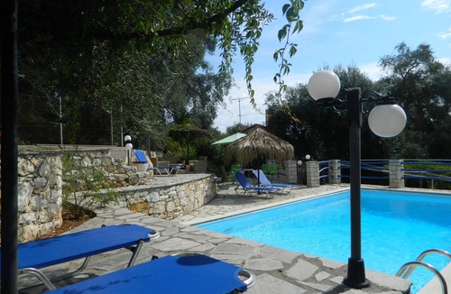 Mpogdanatika Villa | VILLA ALKINOOS - A stone house between olive trees